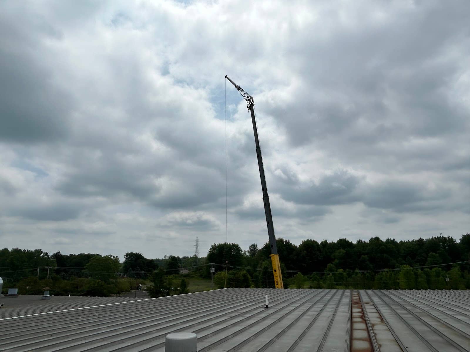 Canal Crane telescopic crane boom raised against the sky in Northeast Ohio